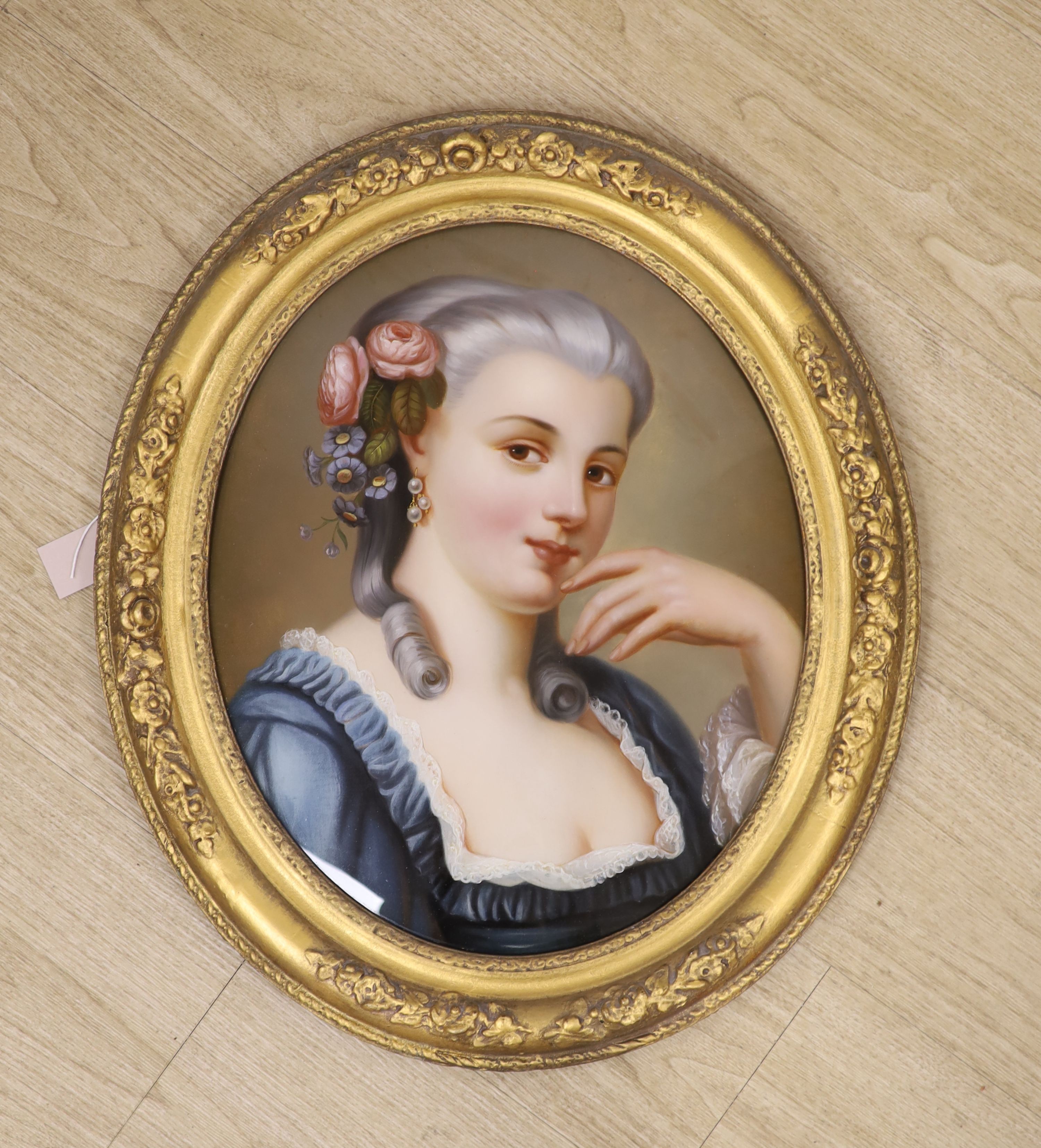 19th century French School, reverse painting on glass, Portrait of a lady, oval, 45 x 36cm